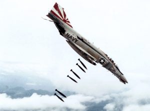 A U.S. Navy F-4B from VF-111 dropping bombs over Vietnam, 25 November 1971
